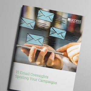 A person using a tablet with an overlay of illustrated envelope icons, symbolizing emails. The cover text reads, "15 Email Oversights Spoiling Your Campaigns" with the company name "Access Marketing Company" in the corner.