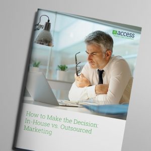 Cover of a brochure titled "How to Make the Decision: In-House vs. Outsourced Marketing." It features a man in an office setting, thoughtfully looking at a laptop, holding glasses. The logo "Access Marketing Company" is at the top right.