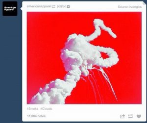 A cloud formation against a bright red sky resembling smoke trails or abstract shapes, shared amid discussions on how brands should respond to tragedies, garners significant attention on social media with 11,004 notes and tags "Smoke" and "Clouds".