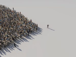 A large crowd of people stands to the left, facing a single person at a distance to the right in an open space, casting long shadows. The scene is in a minimalist setting with a neutral background.