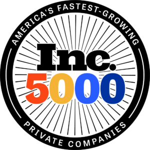 Logo with a circular design displaying "America's Fastest-Growing Private Companies" around the edge. In the center, it reads "Inc. 5000" in bold black and colorful letters on a radial striped background.