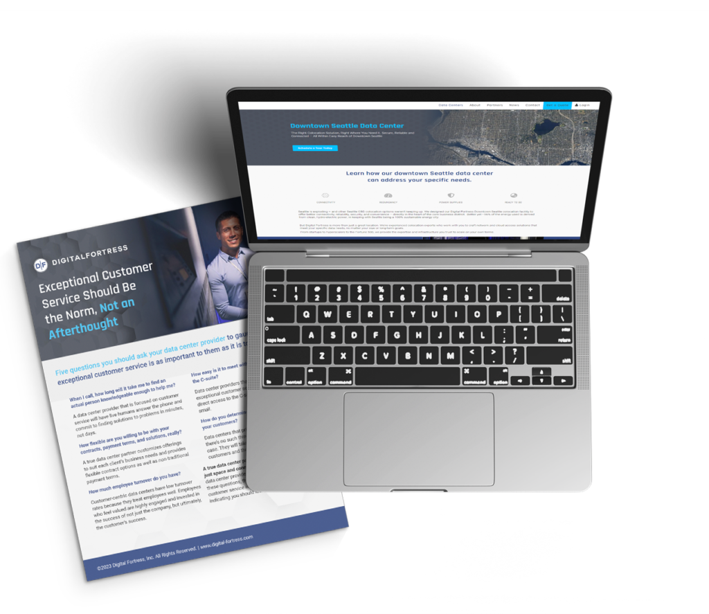 A laptop displaying a website is open next to a promotional brochure. The page on the laptop shows a map and text about a Seattle data center. The brochure features information on customer service from Digital Fortress.