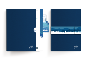 Two dark blue folders with an MTA logo. One is open, revealing documents and a card with a landscape design featuring mountains and trees. The other is closed, displaying the same landscape across the middle.