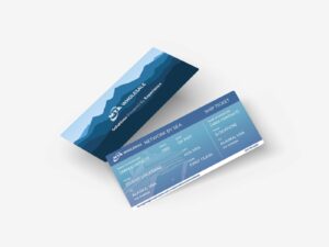 A blue shipping ticket with "MTA Wholesales" logo and placeholders for name, contact, ID, location, date, and class details. The top features a mountain and sea illustration. The ticket is labeled "First Class.
