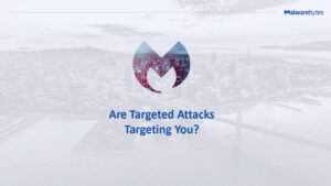 A Malwarebytes logo is centered over a grayscale cityscape background. Below the logo, text reads, "Are Targeted Attacks Targeting You?.