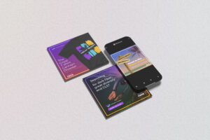 Three square booklets and a smartphone on a gray surface. The booklets feature colorful covers with various abstract designs and text, while the smartphone displays similar themed content on its screen.