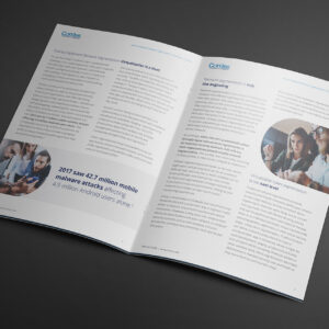 An open magazine spread featuring articles on network segmentation and virtualization. The left page contains a highlighted statistic on mobile malware, and the right page shows a photo of people collaborating.