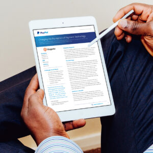 A person holding a tablet displaying a document titled "Changing the Perception of Payment Technology" with the PayPal logo. The page features a company snapshot and detailed text, and the person is using a stylus pen.