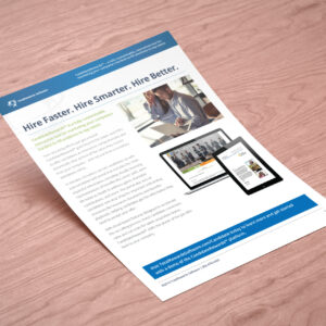 A flyer lays on a wooden surface. It features text about hiring solutions, a background image of a person smiling while on the phone, and photos of a desktop and mobile device displaying related content.