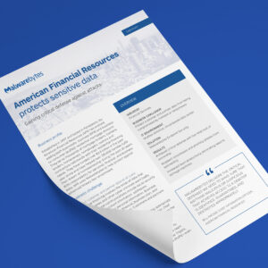 A document on a blue surface titled "American Financial Resources protects sensitive data." The page includes sections on business problems, challenges, solutions, results, and has the Malwarebytes logo.