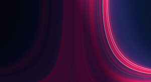 Abstract image featuring smooth, flowing lines of pink and red on a dark background. The lines create a sense of motion and fluidity, resembling cascading waves or light trails.