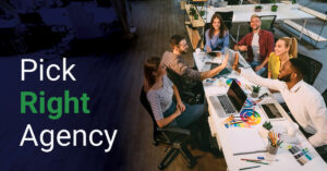 Six diverse young professionals sit around a table with laptops and color swatches, high-fiving and smiling. Text on the left reads, "Pick Right Agency." The office environment is modern and collaborative.