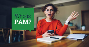 A confused woman in glasses and a red sweater sits at a table with a phone and notebook, raising her hand. A green text box beside her reads, “Who is PAM?”.